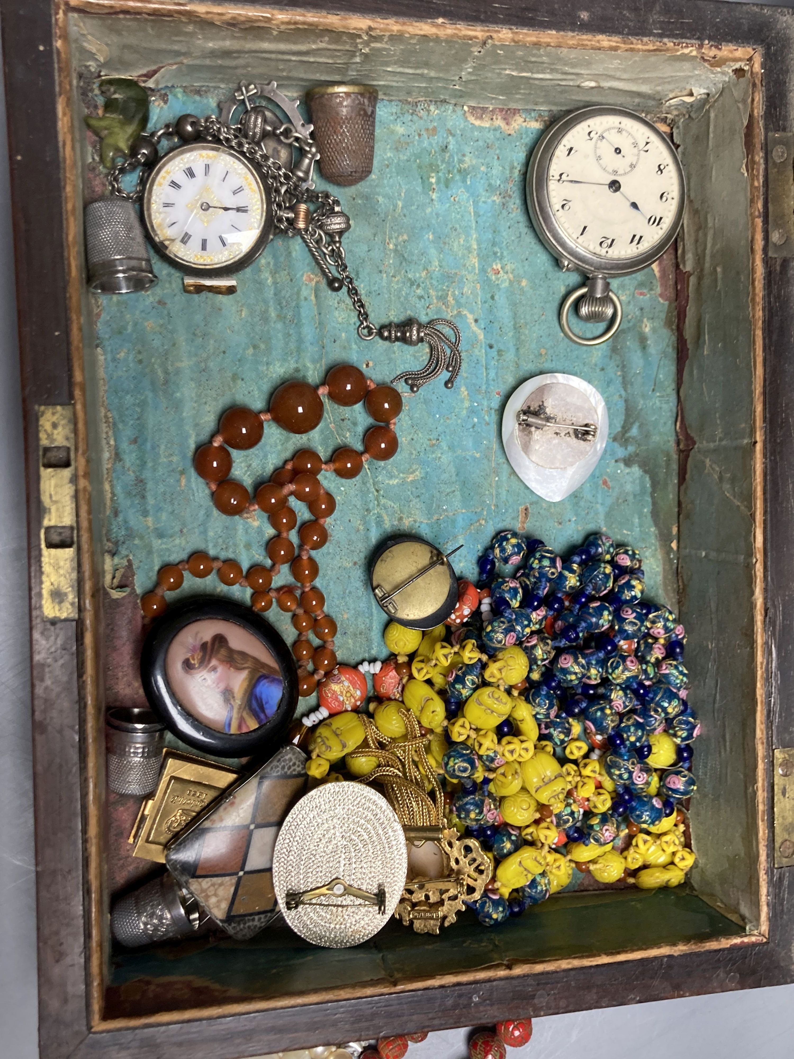 A silver travelling watch case, two pocket watch and assorted jewellery including knot stick pin, costume, necklaces etc.